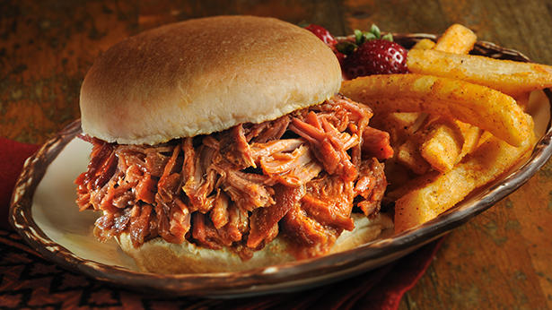slow cooker pork sandwich with french fries
