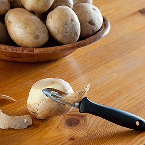 potatoes and vegetable peeler